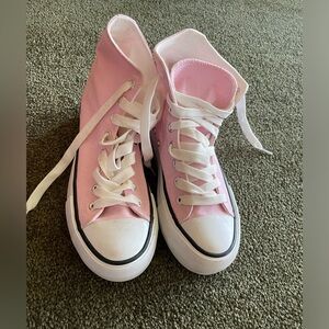 Chuck Taylor platform high top sneakers